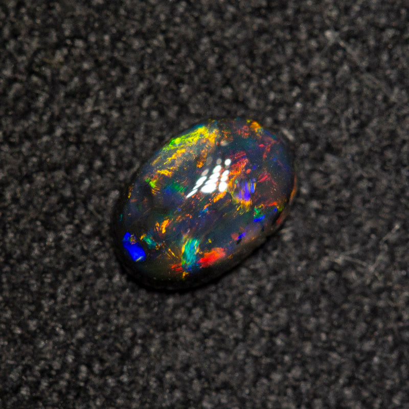 0.18 ct black opal 4.9x3.3x1.7mm