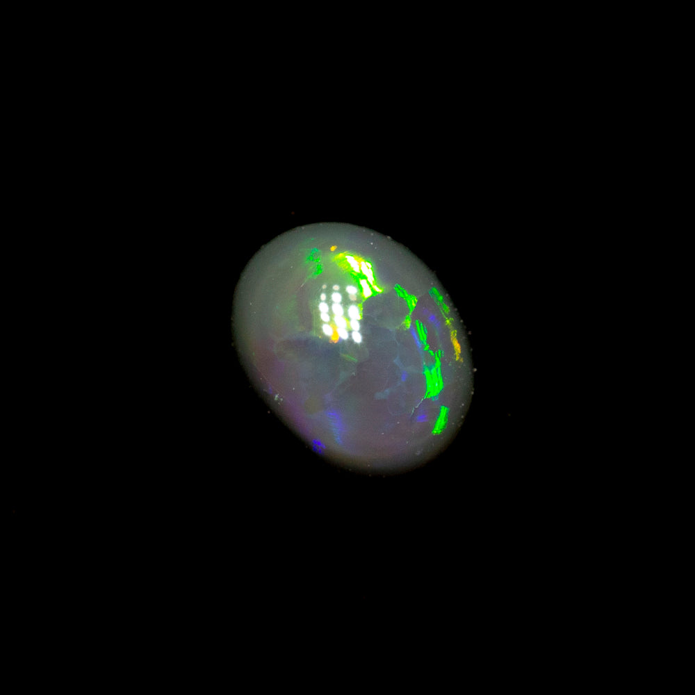 0.18 ct black opal 4.6x3.7x1.7mm