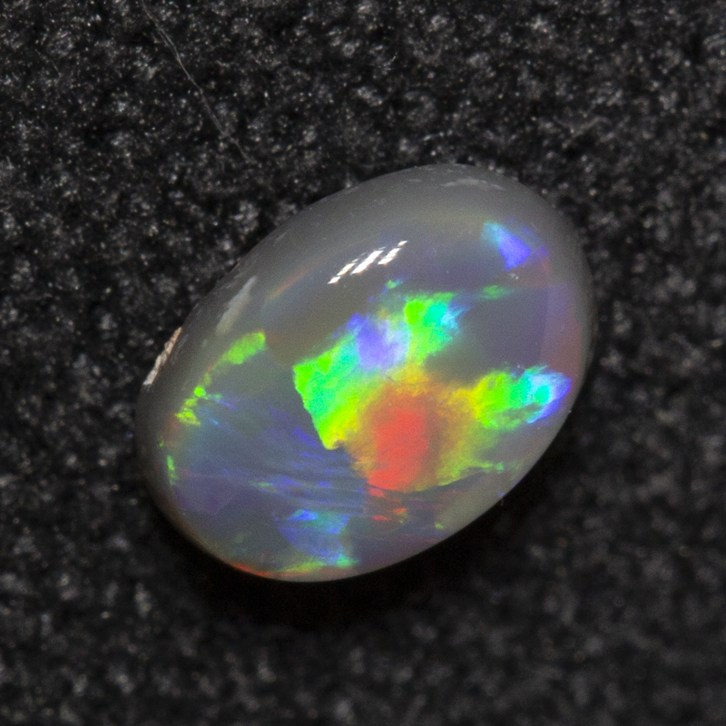 0.23 ct dark opal 4.9x3.6x2mm