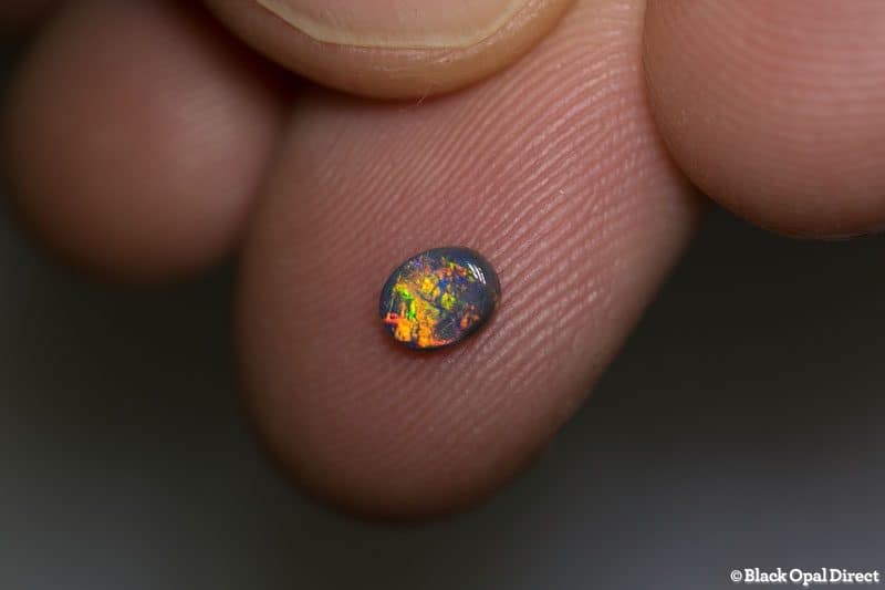 0.23 ct black opal 5x4x1mm