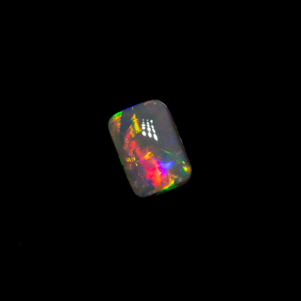 0.25 ct dark opal 4.8x3.3x2.1mm