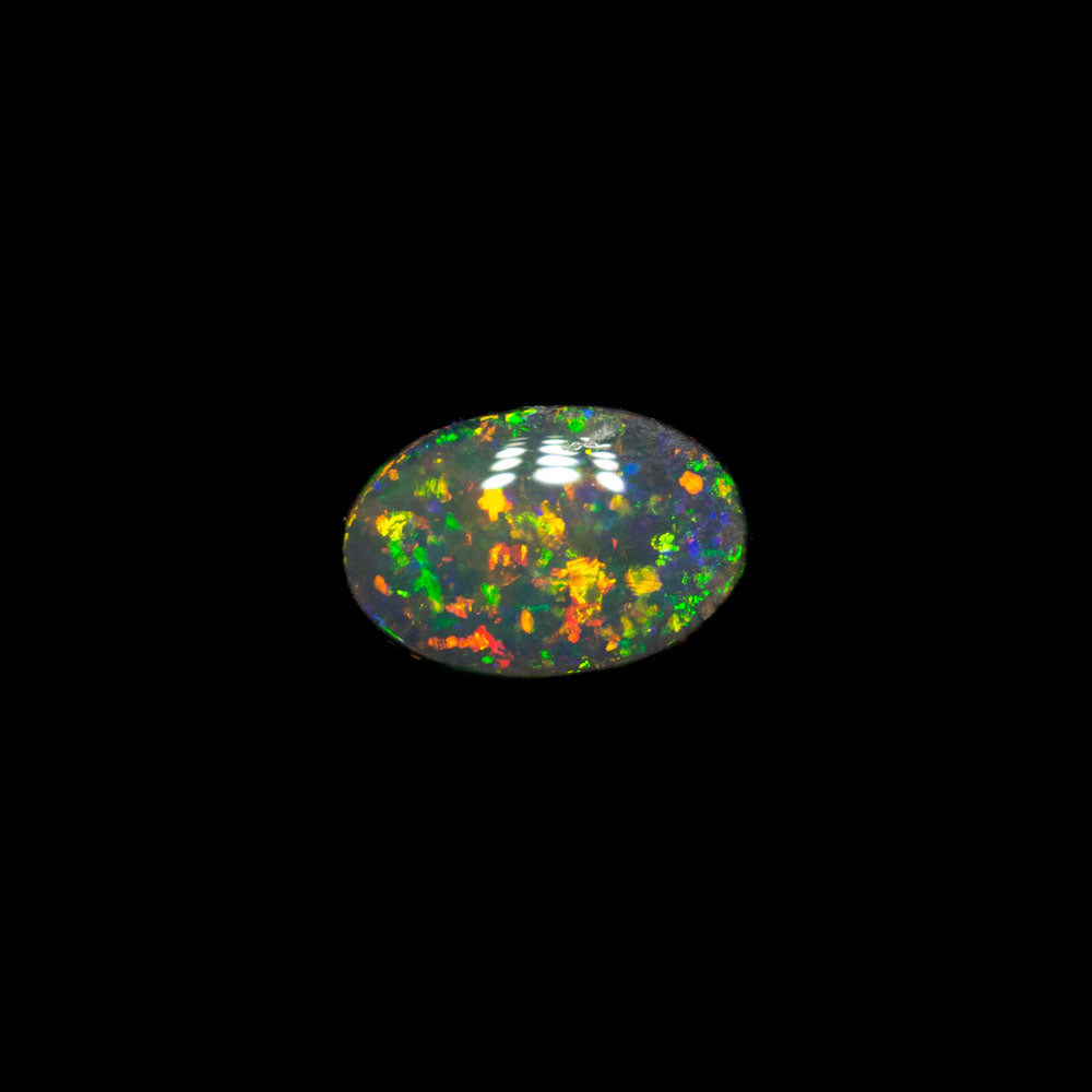0.26 ct black opal 5.4x3.7x1.8mm