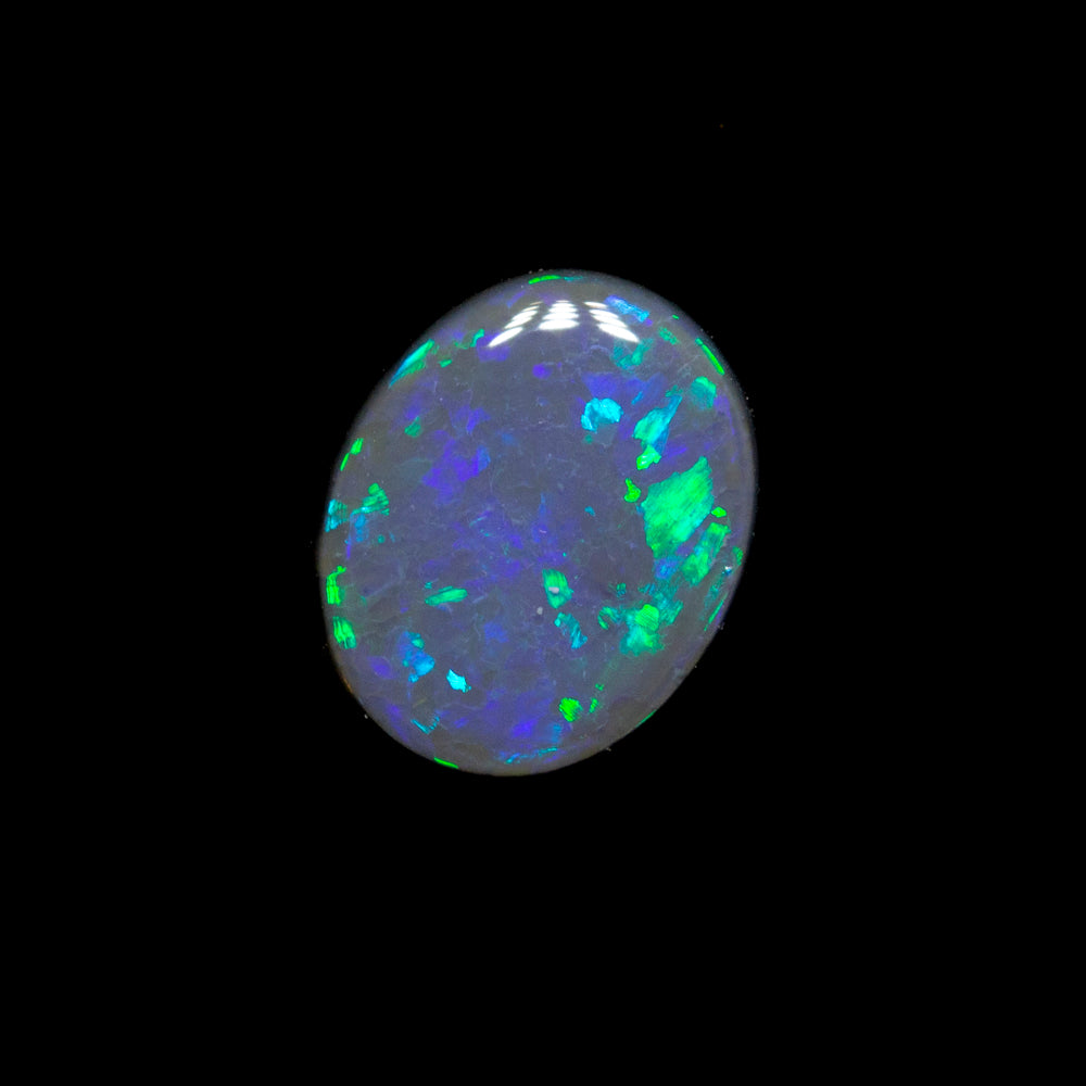0.31 ct black opal 6x4.9x1.5mm
