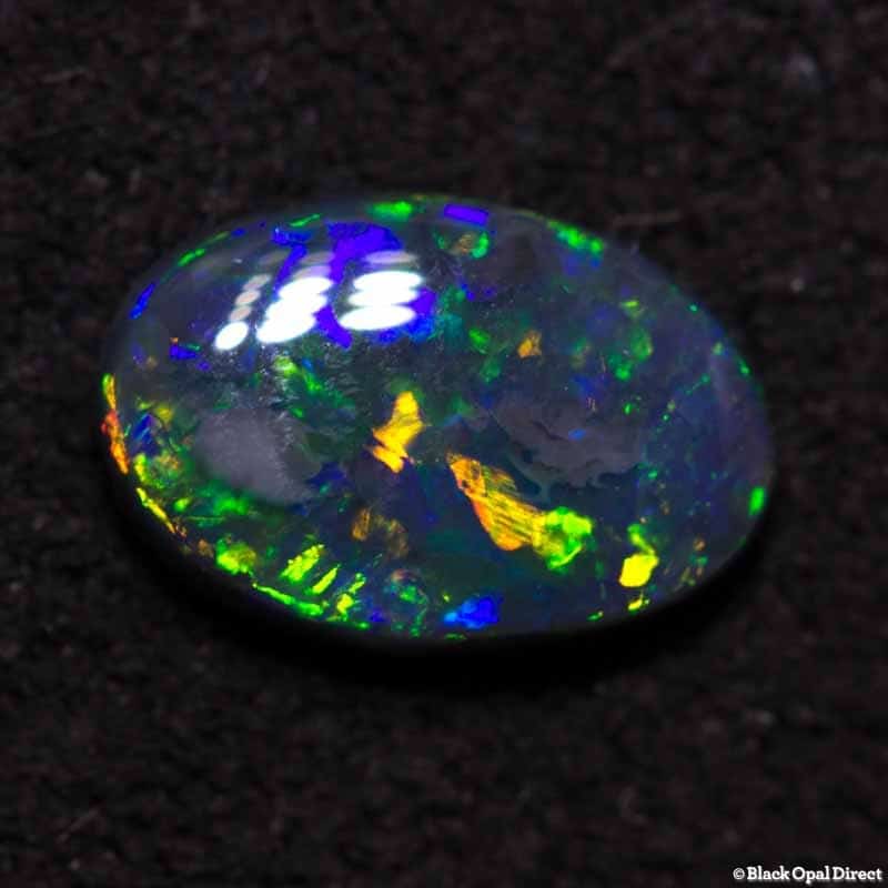 0.31 ct black opal 7x4.5x1.5mm