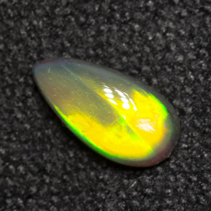 0.35 ct dark opal 6.5x3.3x2.4mm