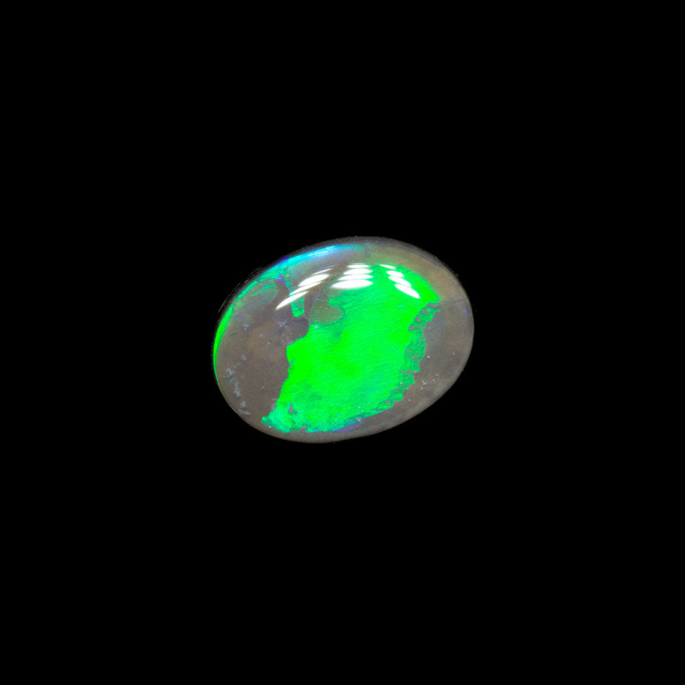 0.35 ct dark opal 5.7x4.4x1.9mm