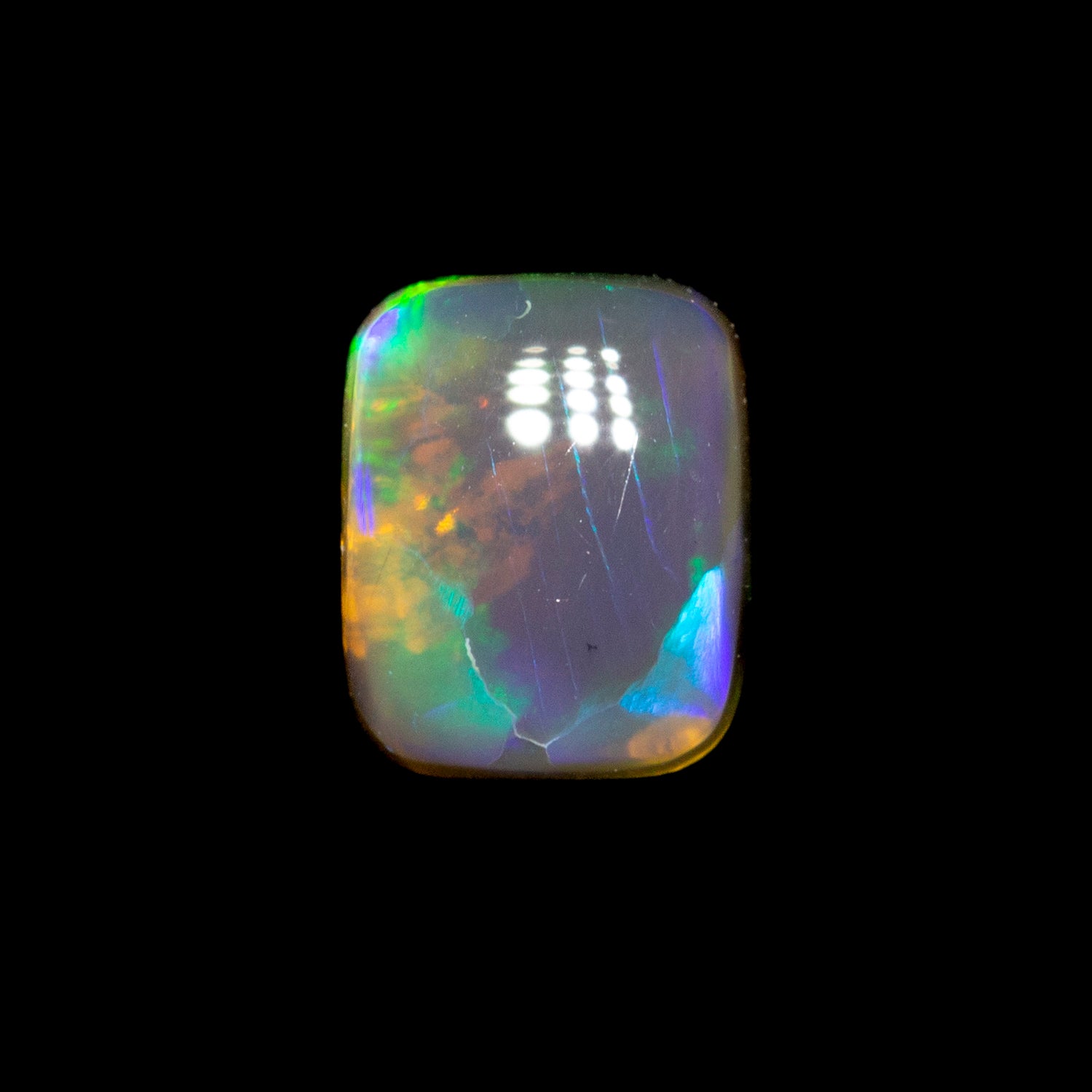 0.36 ct black crystal opal 5.1x4.2x2.1mm