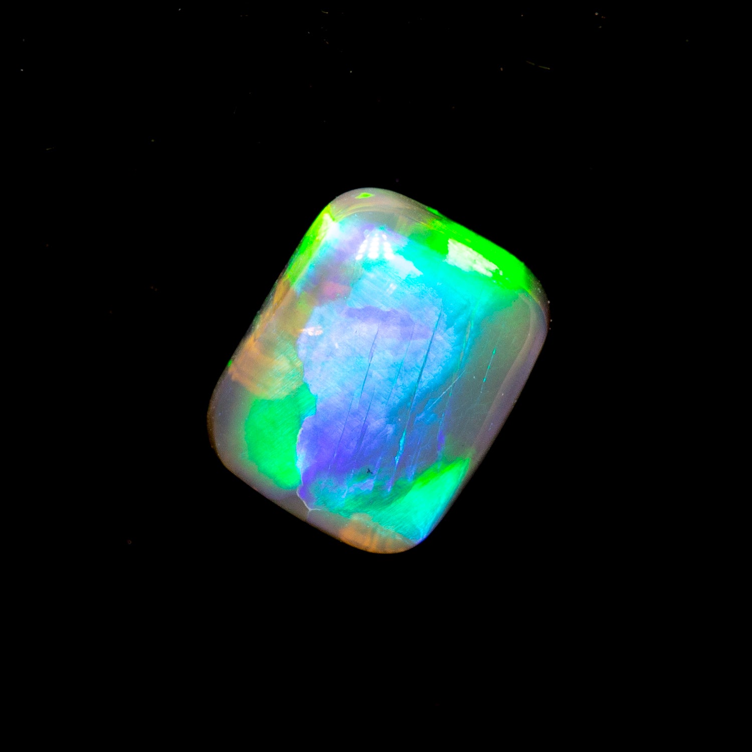 0.36 ct black crystal opal 5.1x4.2x2.1mm
