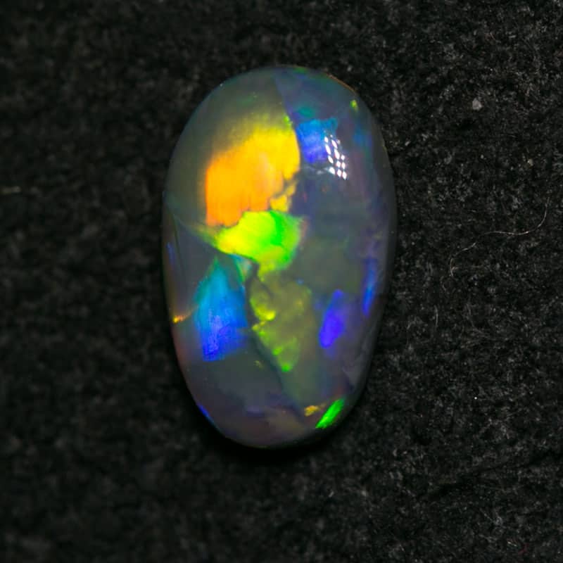0.37 ct dark opal 6.5x5x2mm