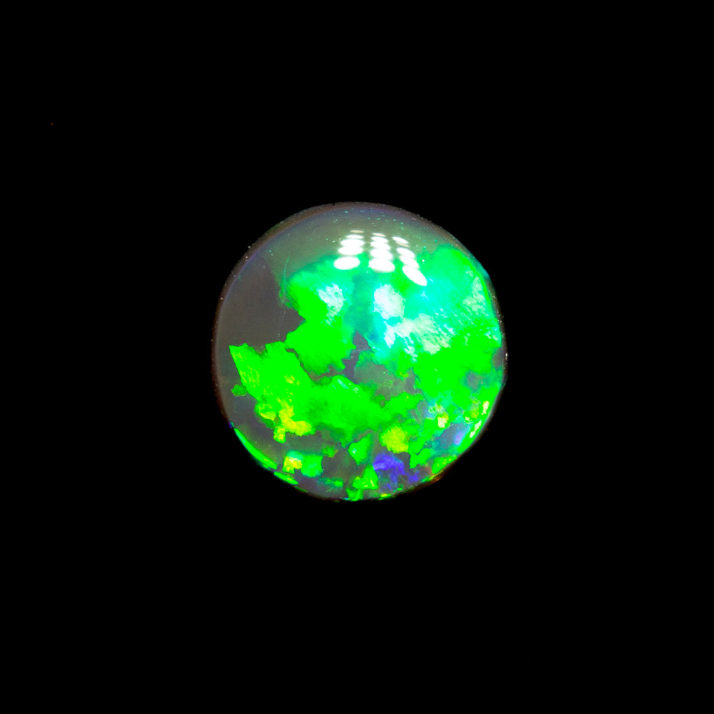 0.38 ct black crystal opal 5.9x5.8x1.7mm