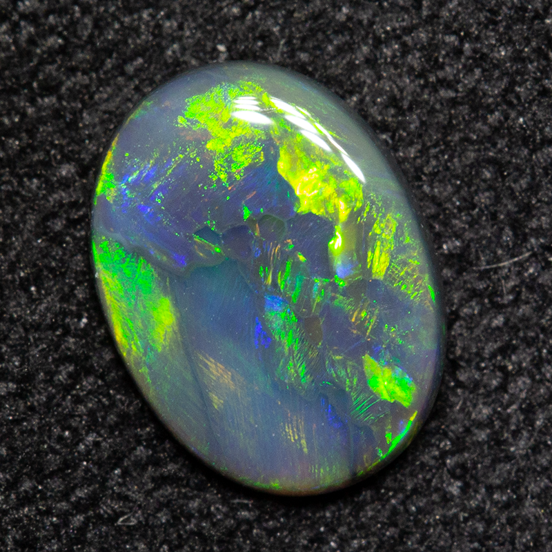 0.40 ct black opal 7.1x5.3x1.6mm