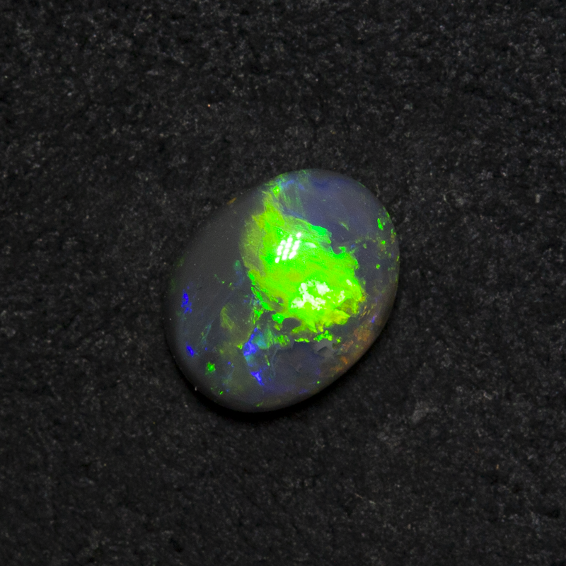 0.40 ct black opal 5.9x4.7x2.6mm