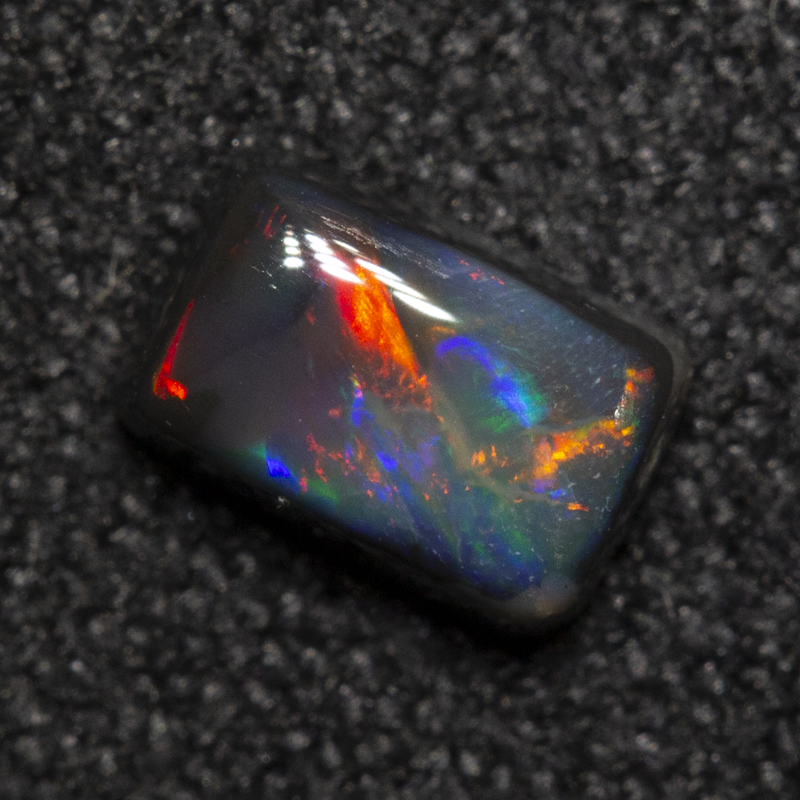 0.40 ct black opal 5.5x3.7x2.4mm