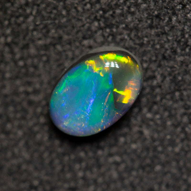 0.40 ct black opal 5.5x3.8x2.7mm