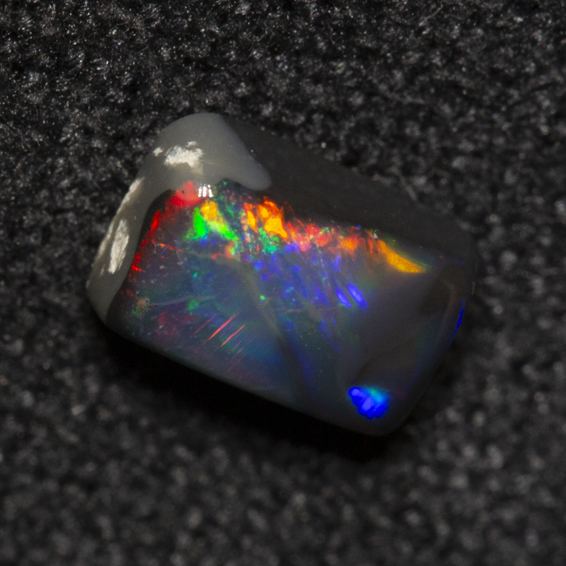 0.40 ct black opal 5.5x3.7x2.4mm