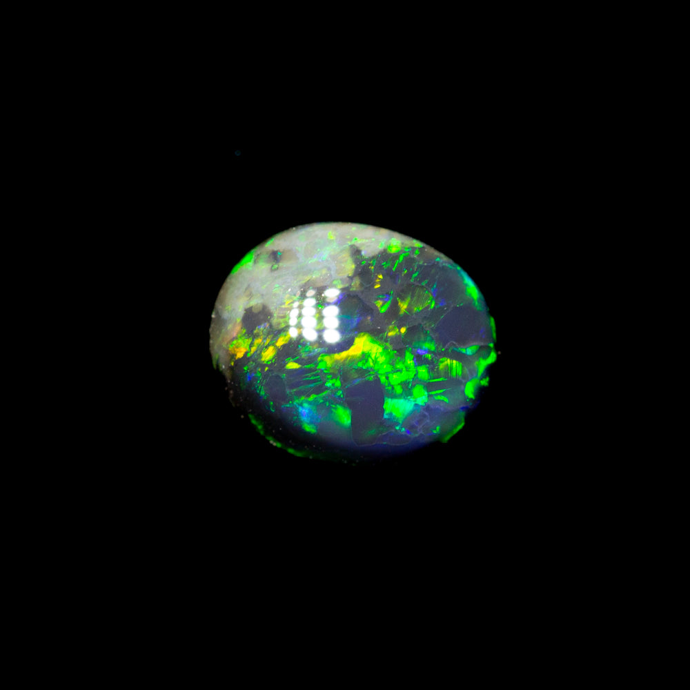 0.40 ct black opal 5.6x4.6x2.6mm