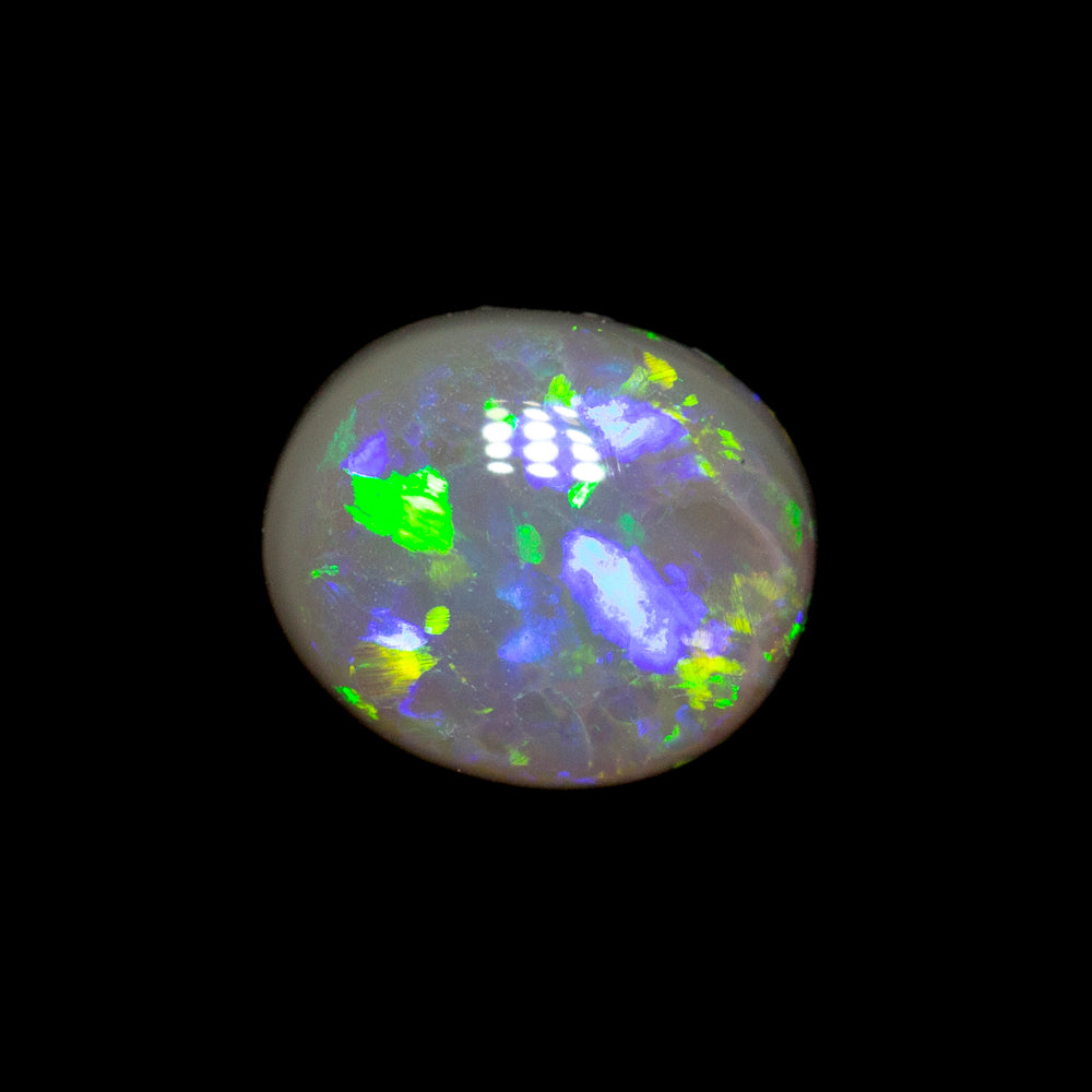 0.40 ct black opal 5.7x4.9x2.1mm