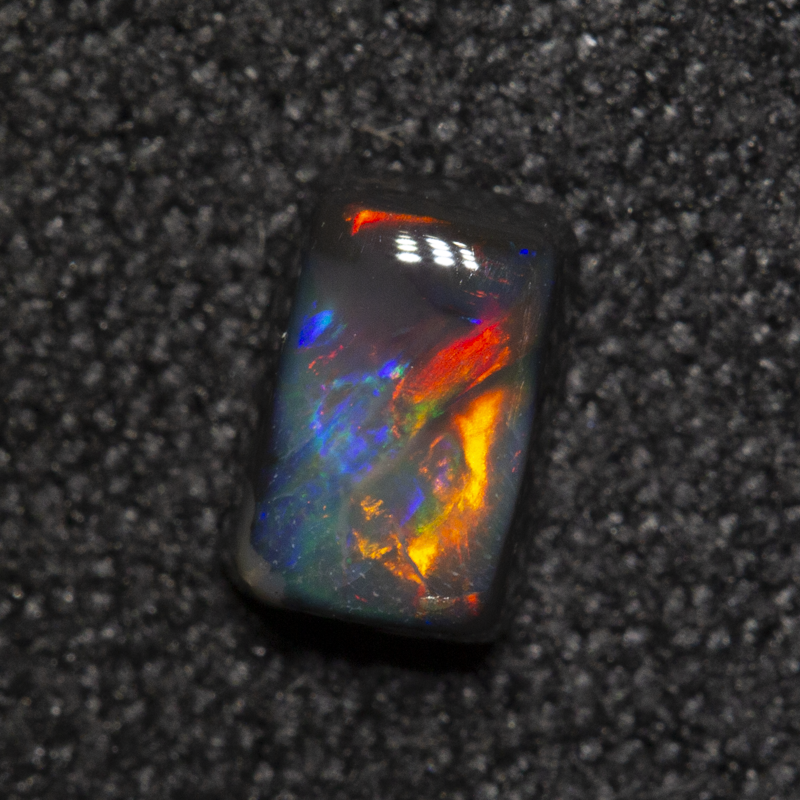 0.40 ct black opal 5.5x3.7x2.4mm