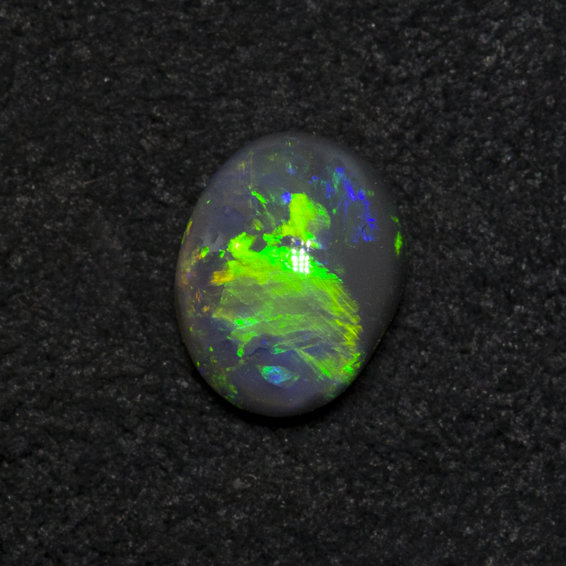 0.40 ct black opal 5.9x4.7x2.6mm