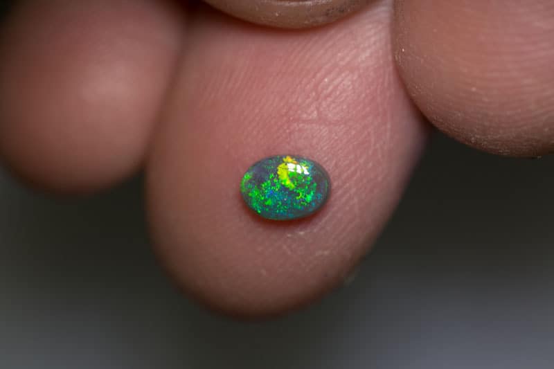 0.40 ct dark opal 6x4x2mm