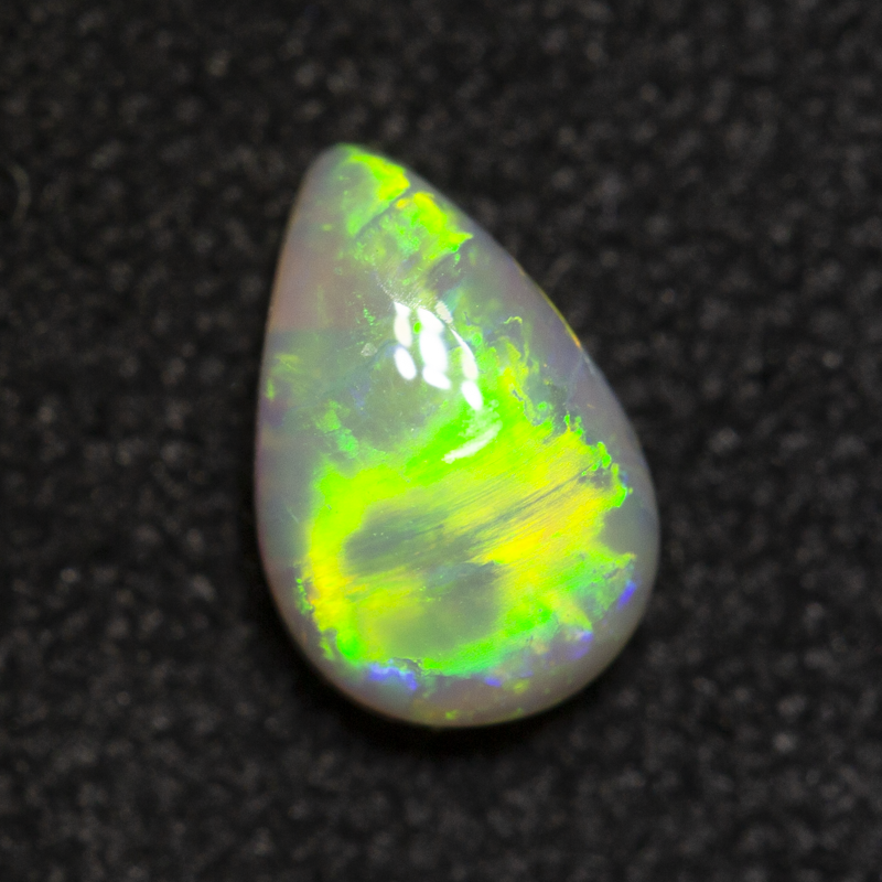 0.41 ct dark opal 6.4x4.2x2.5mm