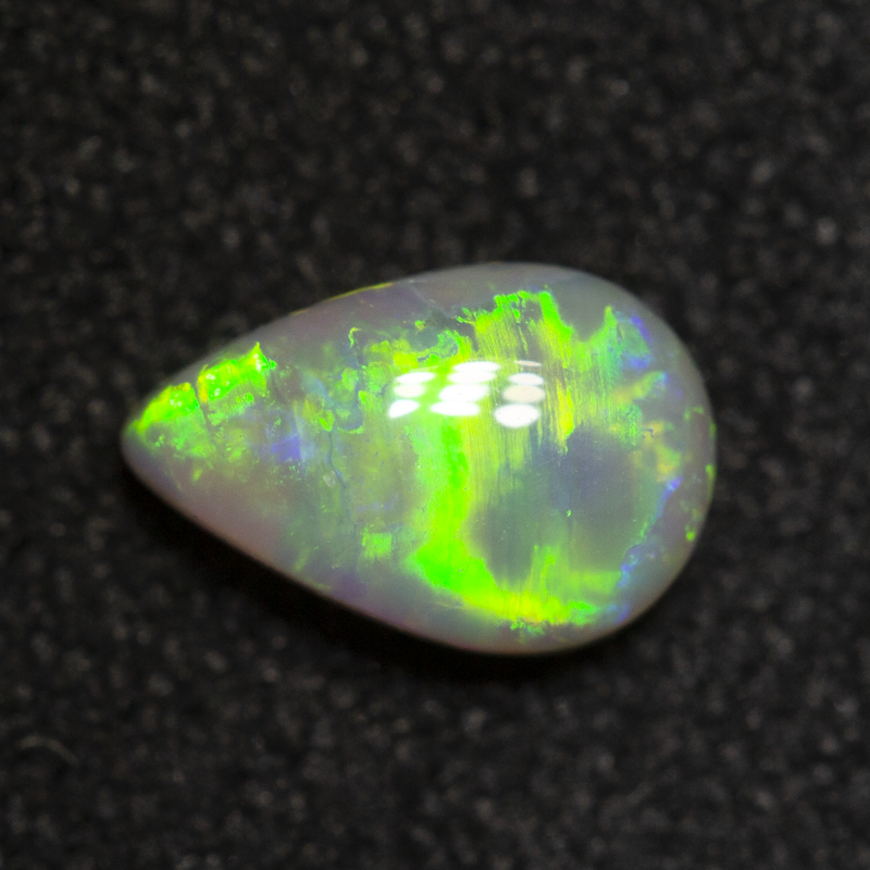 0.41 ct dark opal 6.4x4.2x2.5mm