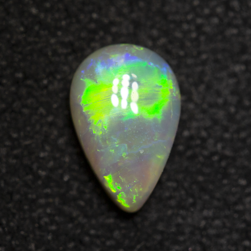0.41 ct dark opal 6.4x4.2x2.5mm