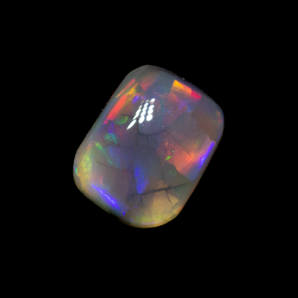 0.41 ct black opal 5.9x4.6x2mm