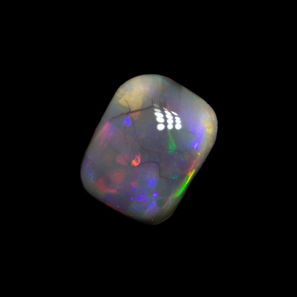0.41 ct black opal 5.9x4.6x2mm