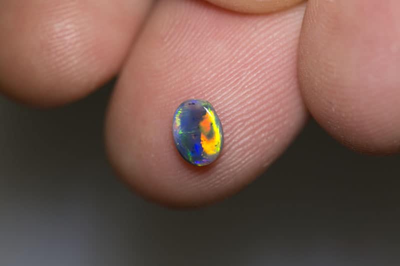 0.41 ct dark opal 6x4.5x2mm