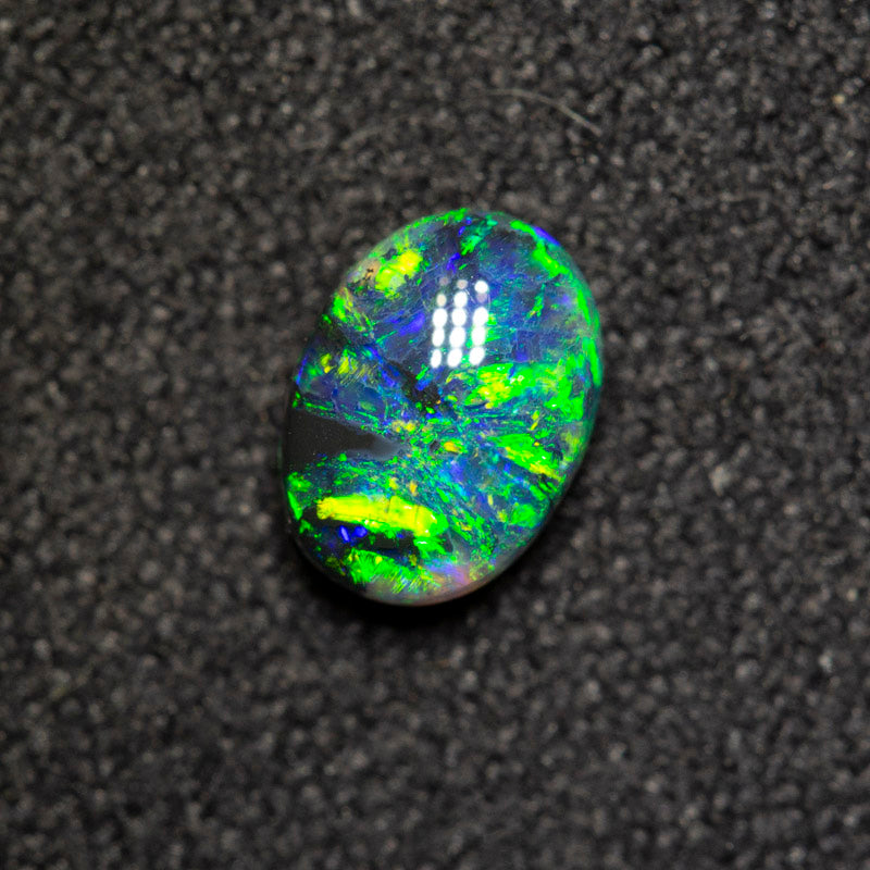 0.42 ct black opal 6x4.4x2.8mm