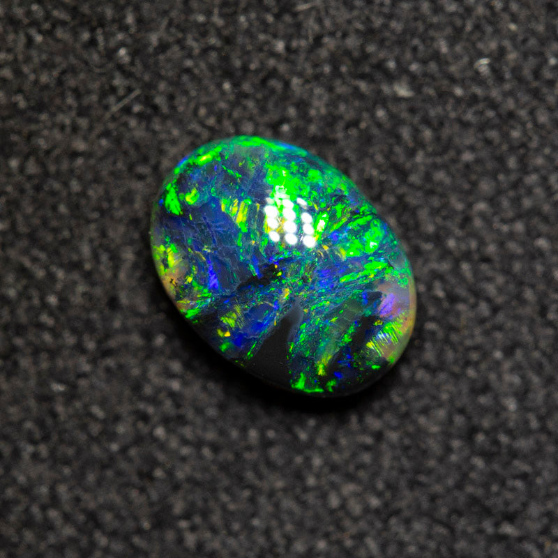 0.42 ct black opal 6x4.4x2.8mm