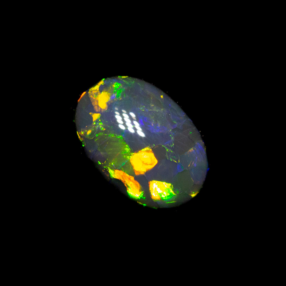 0.42 ct black opal 6.1x4.4x2.5mm