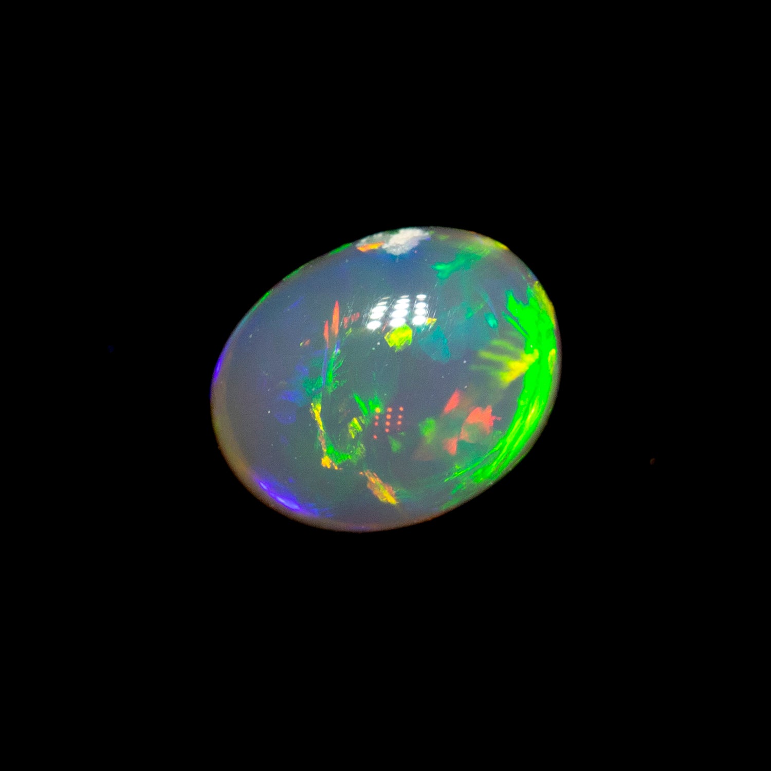 0.42 ct black crystal opal 5.3x4.2x3.1mm