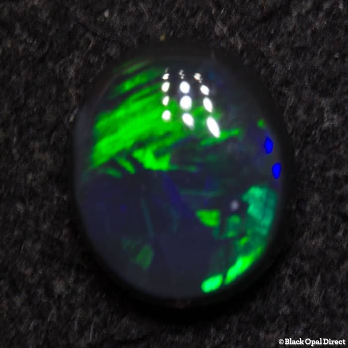 0.42 ct black opal 5.5x5x2mm