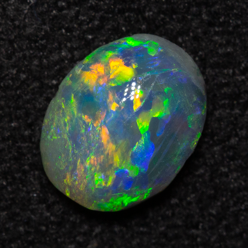 0.43 ct dark opal 6.1x4.8x2.5mm