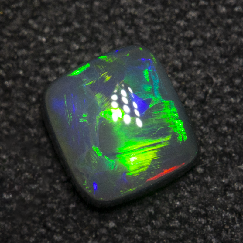 0.43 ct black opal 4.9x4.6x2.4mm