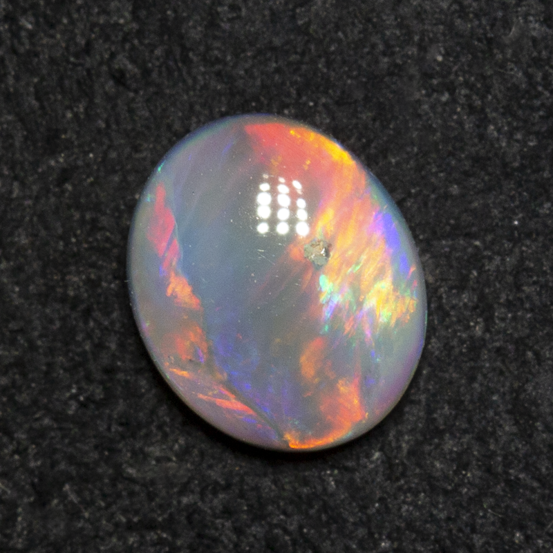 0.43 ct dark opal 6.1x5.1x2.3mm