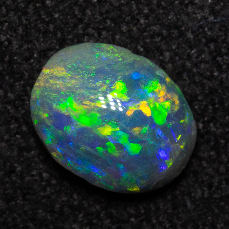 0.43 ct dark opal 6.1x4.8x2.5mm