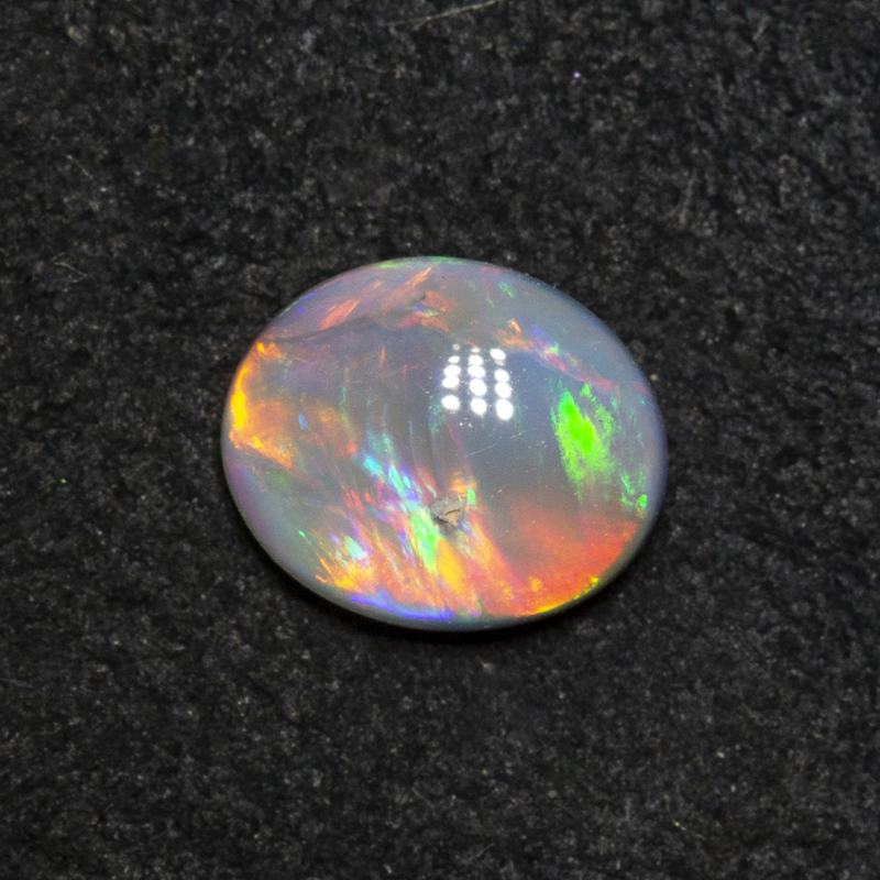 0.43 ct dark opal 6.1x5.1x2.3mm