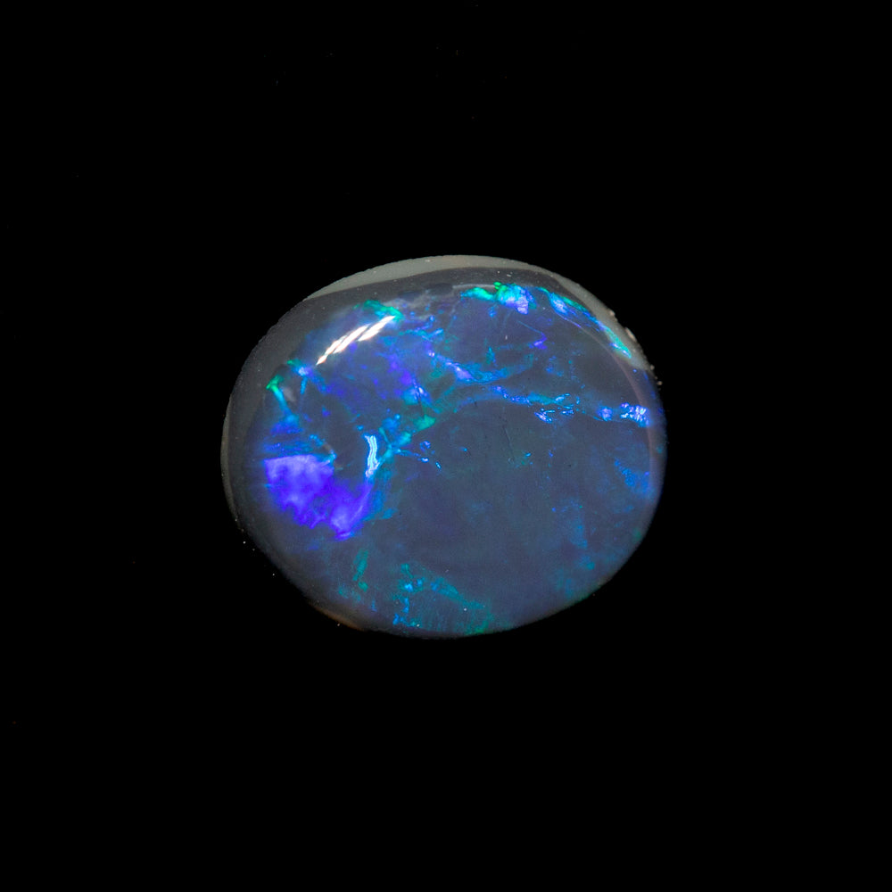 0.43 ct black opal 6.4x5.4x1.8mm