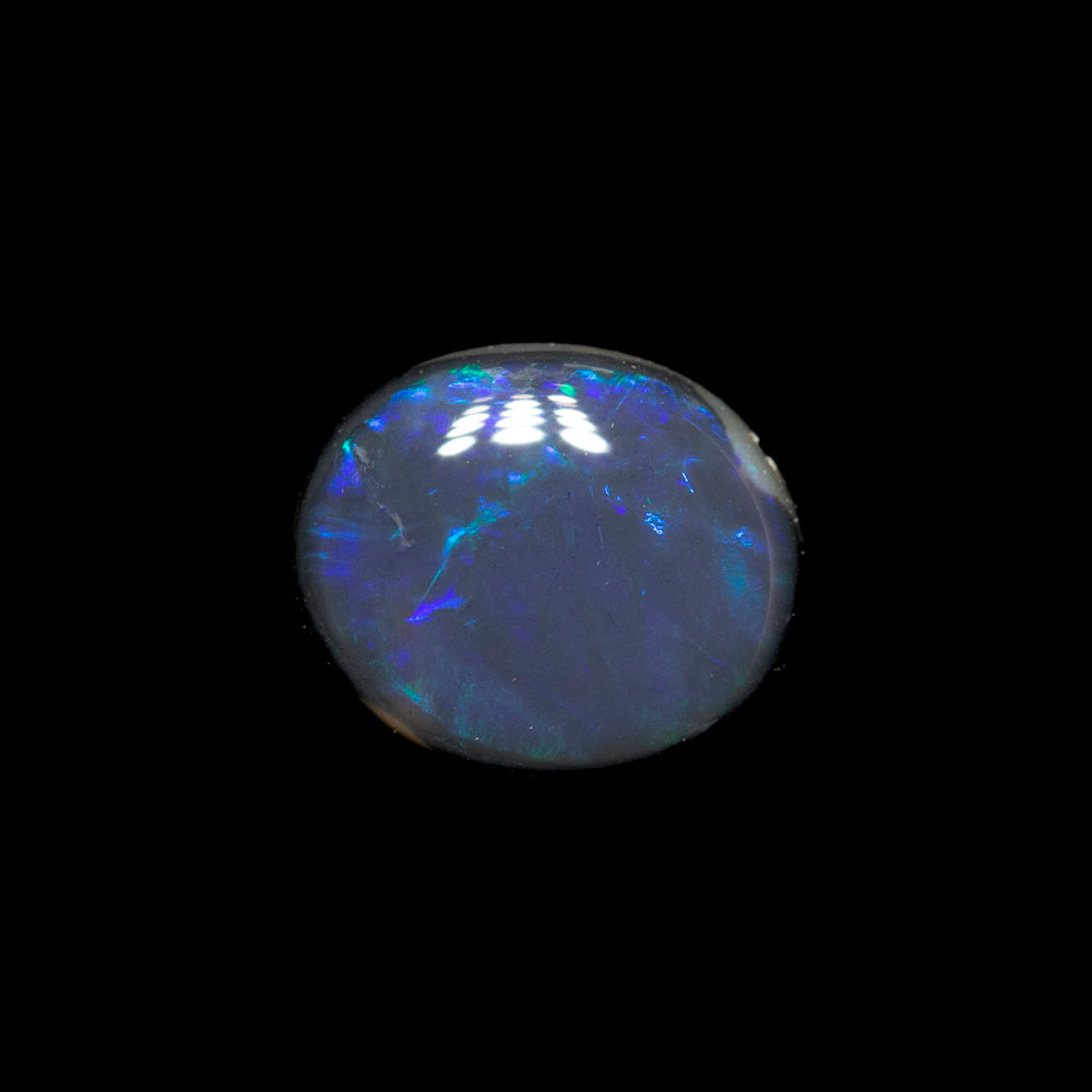 0.43 ct black opal 6.4x5.4x1.8mm