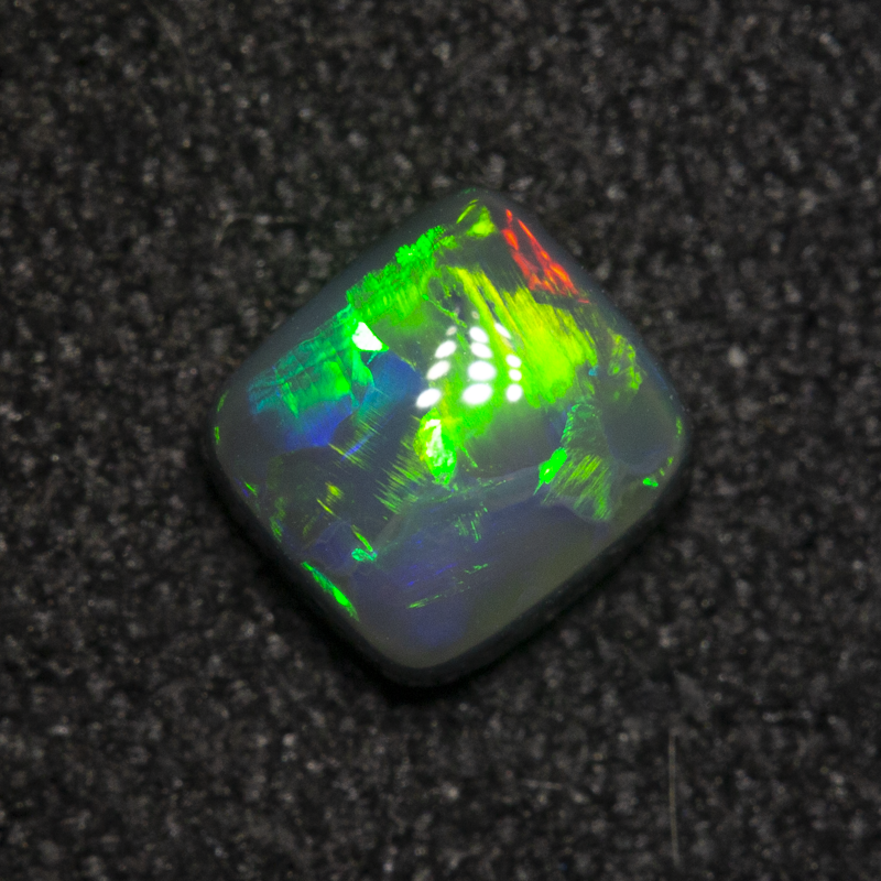 0.43 ct black opal 4.9x4.6x2.4mm