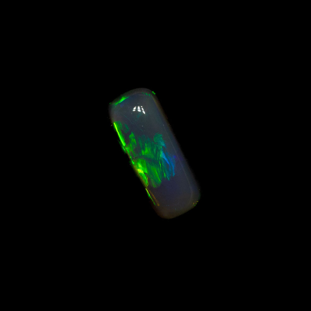 0.44 ct black crystal opal 7.1x2.9x2.6mm
