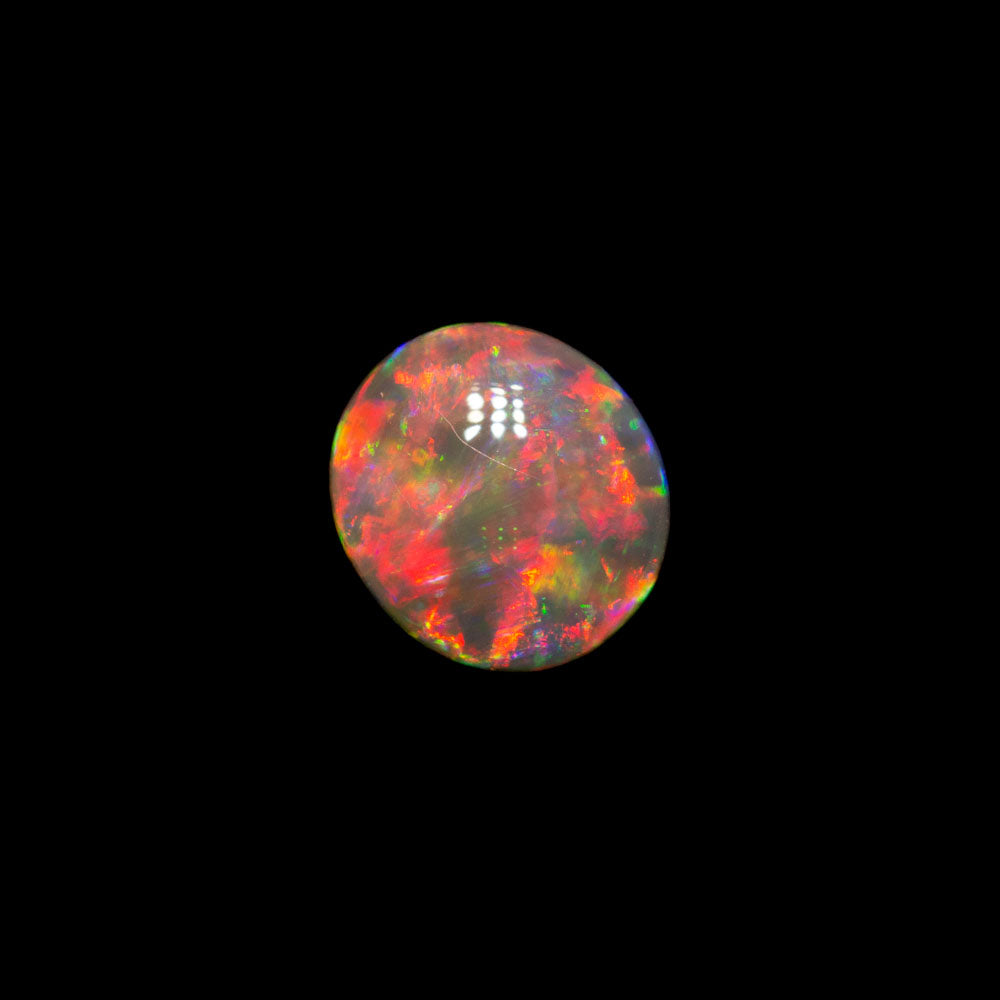 0.45 ct double-sided crystal opal 5.7x5.2x2.4mm