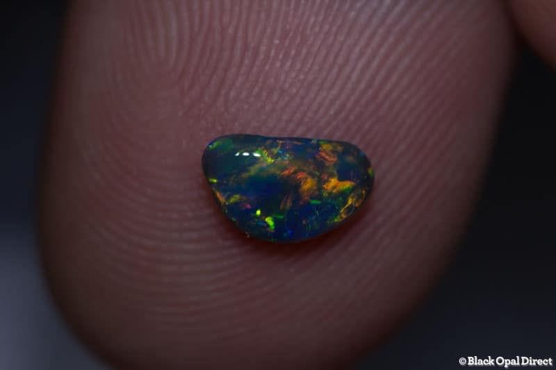 0.45 ct black opal gem 7x5x2mm