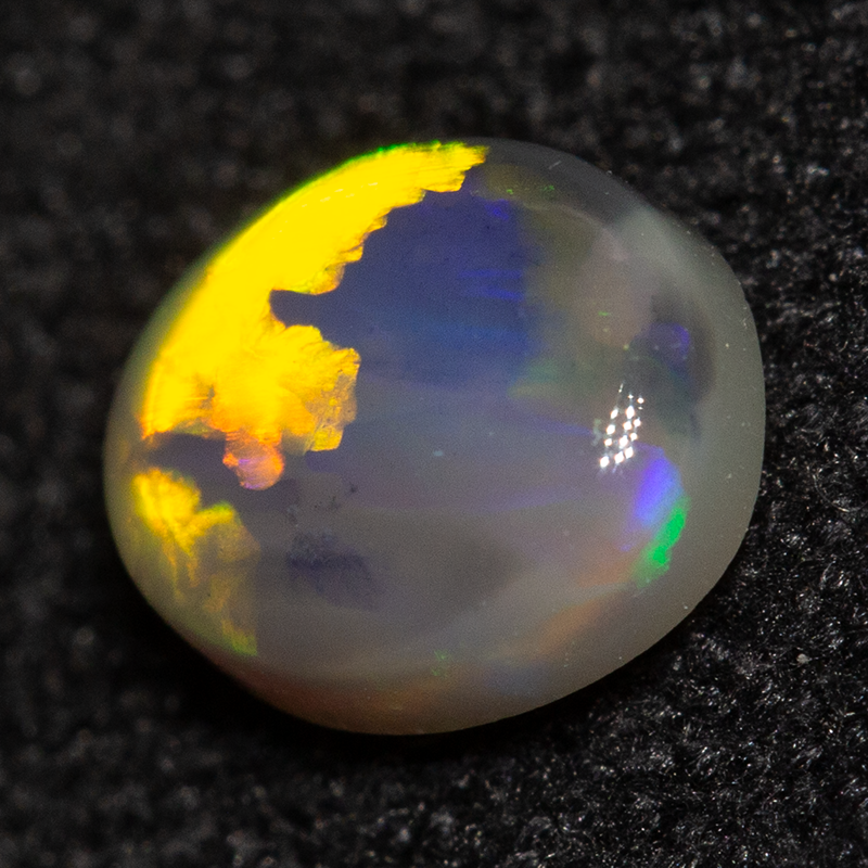 0.46 ct dark opal 5.6x4.8x2.4mm