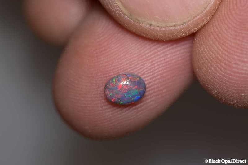 0.46 ct semi black opal 6x4.5x2mm