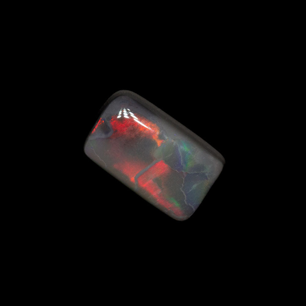 0.49 ct dark opal 6.4x3.9x2.3mm