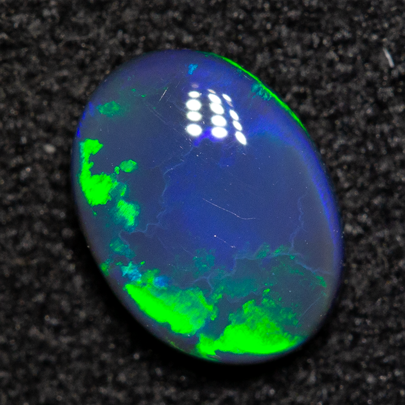 0.50 ct black opal 6.5x4.9x2.2mm